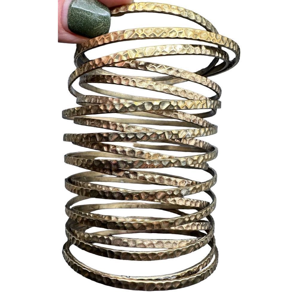 Slinky style hammered coil bangle bracelet one piece gold tone